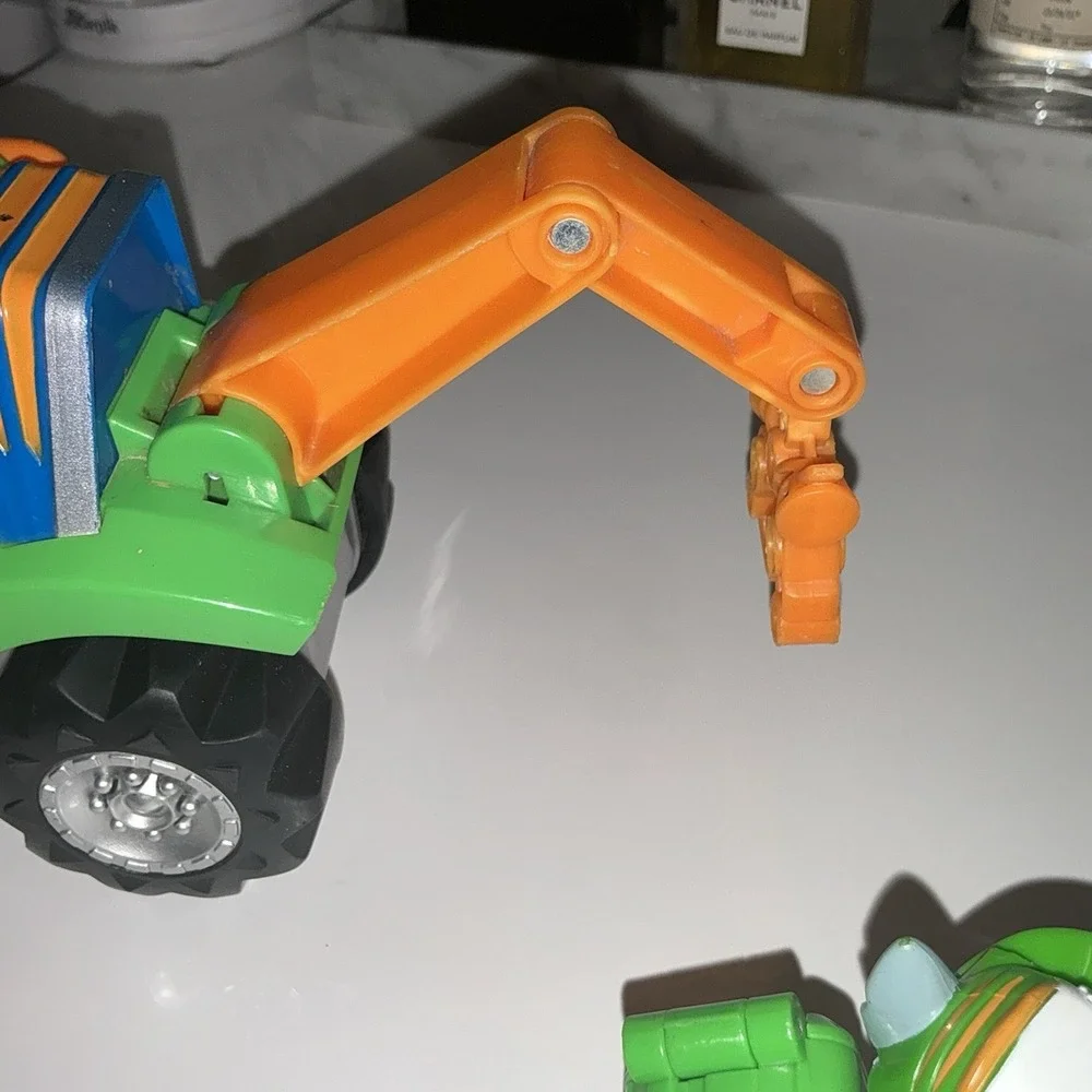 Paw Patrol Rocky Rev Up Deluxe Dino Rescue Vehicle with Dinosaur & Figure